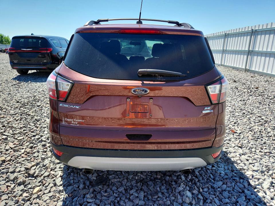 Photo 6 from auction – 2018 FORD ESCAPE with VIN 1FMCU9GD0JUC74190