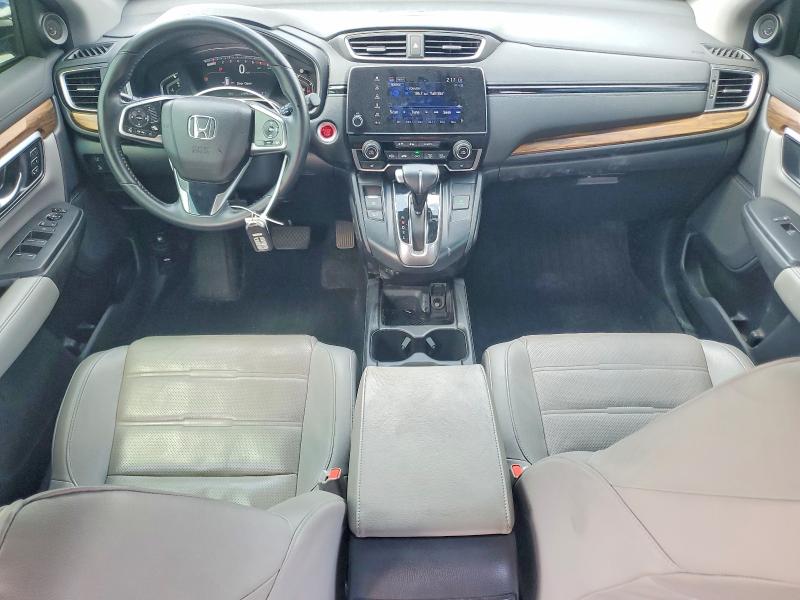 Photo 8 from auction – 2018 HONDA CR-V with VIN 7FARW1H92JE001706