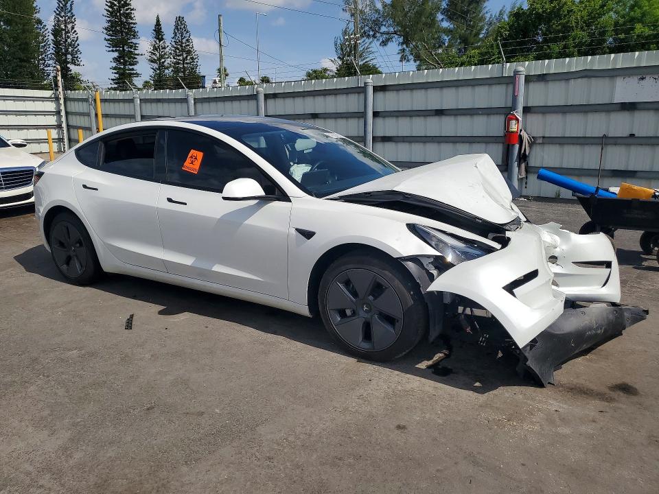 Photo 4 from auction – 2023 TESLA MODEL 3 with VIN 5YJ3E1EA7PF401496