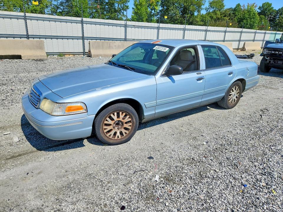 FORD CROWN VICTORIA 2004 with VIN 2FAFP74W44X128980 - Photo from auction