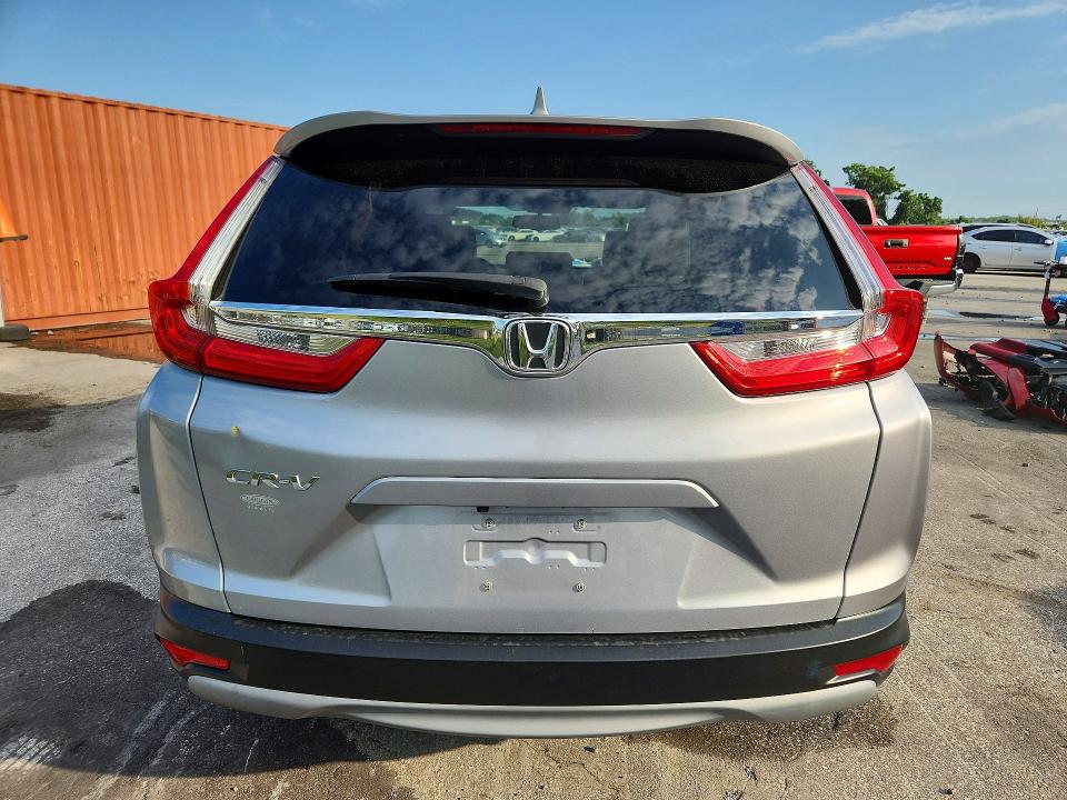 Photo 6 from auction – 2018 HONDA CR-V with VIN 7FARW1H83JE038626