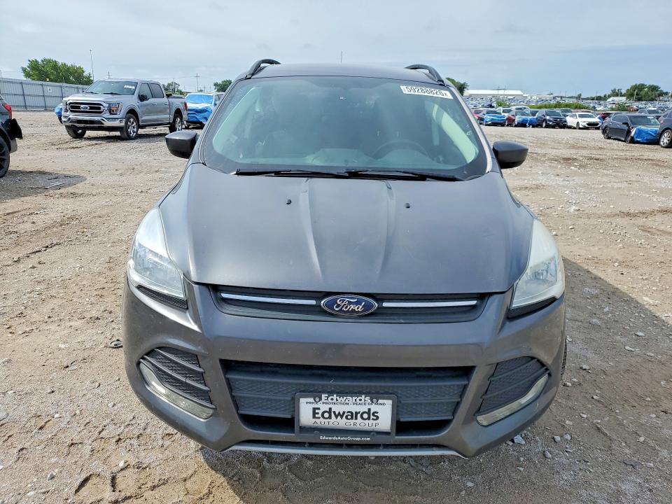Photo 5 from auction – 2015 FORD ESCAPE with VIN 1FMCU9G95FUA67281