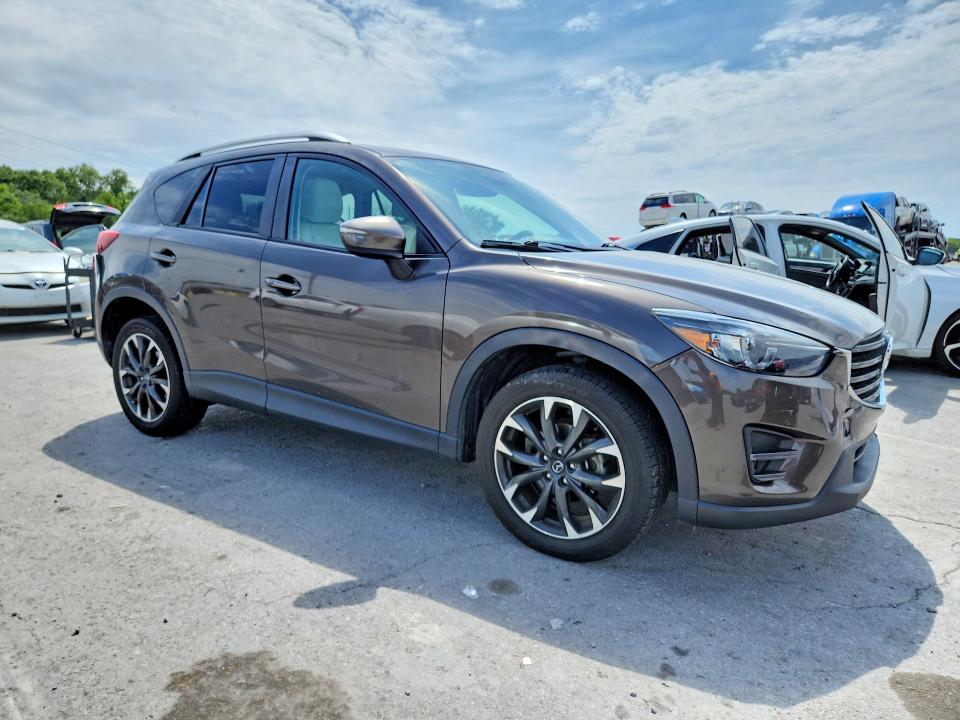 Photo 4 from auction – 2016 MAZDA CX-5 with VIN JM3KE4DY4G0856999