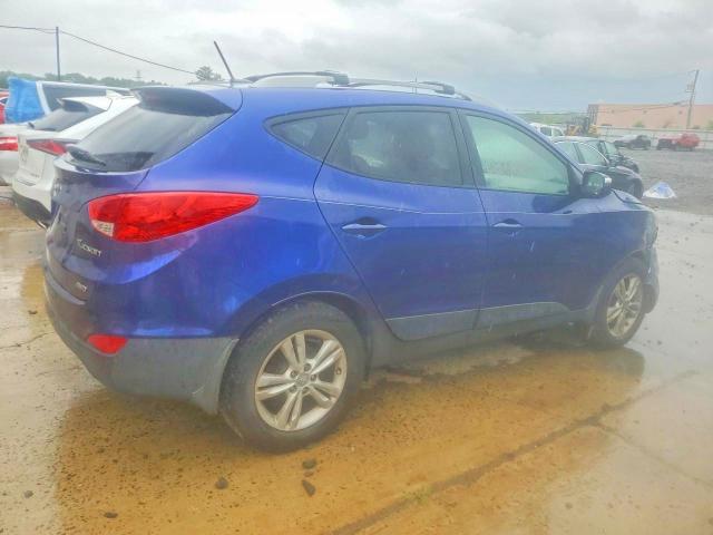Photo 3 from auction – 2012 HYUNDAI TUCSON with VIN KM8JUCAC8CU371872