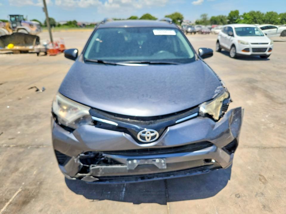 Photo 5 from auction – 2016 TOYOTA RAV4 with VIN JTMZFREV1GJ077592