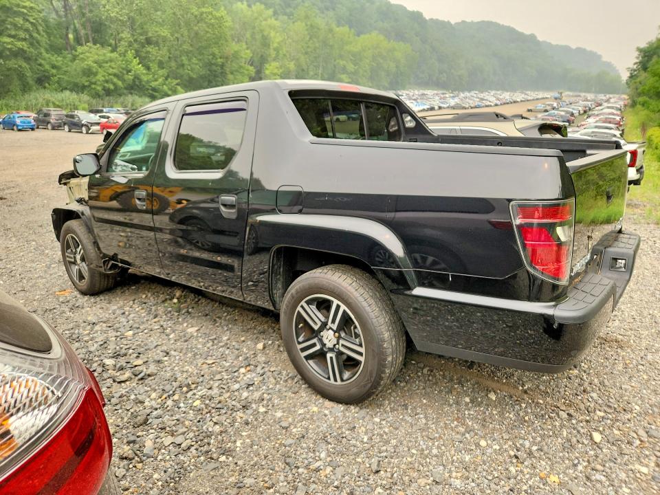 Photo 2 from auction – 2022 HONDA RIDGELINE with VIN 5FPYK3F54NB013089