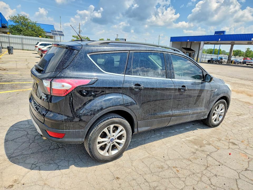 Photo 3 from auction – 2017 FORD ESCAPE with VIN 1FMCU9GD6HUD43300