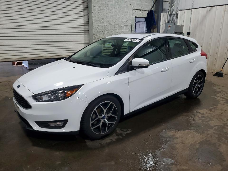 FORD FOCUS 2018 with VIN 1FADP3M23JL272087 - Photo from auction