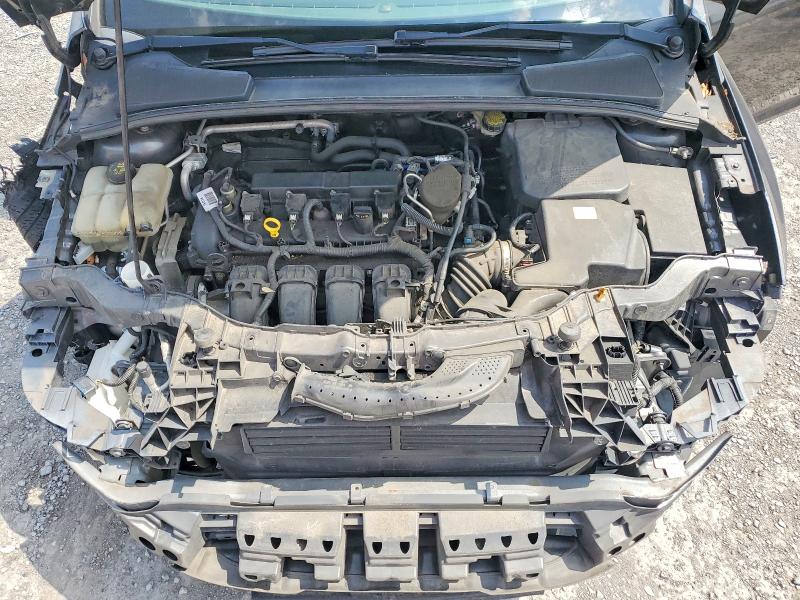 Photo 11 from auction – 2016 FORD FOCUS with VIN 1FADP3F21GL318036
