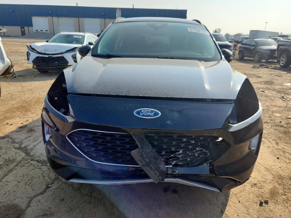 Photo 5 from auction – 2020 FORD ESCAPE with VIN 1FMCU9H92LUA40095