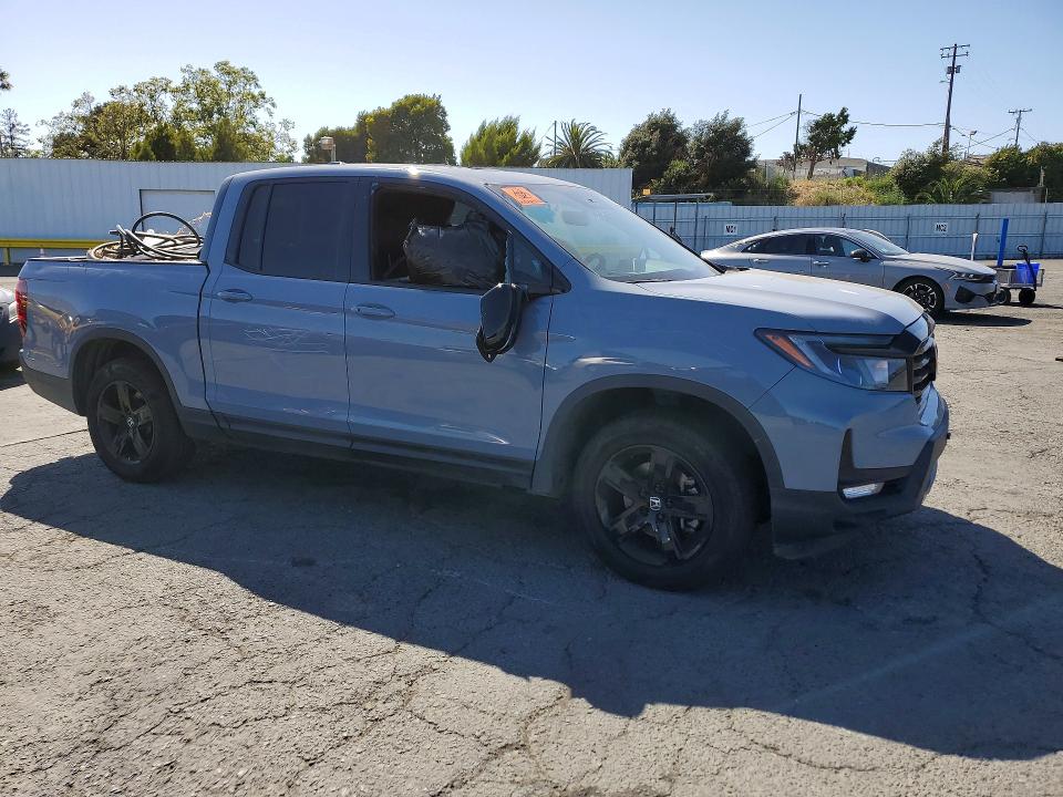 Photo 4 from auction – 2023 HONDA RIDGELINE with VIN 5FPYK3F85PB045093
