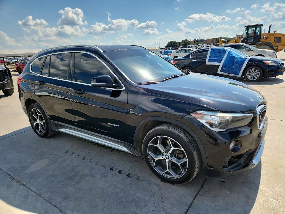 Photo 4 from auction – 2018 BMW X1 with VIN WBXHU7C39J5H44227