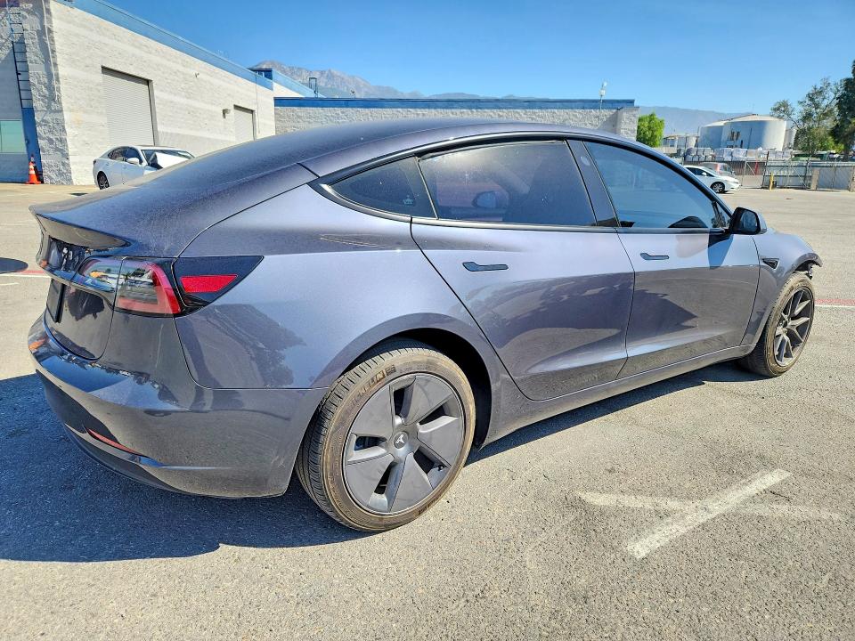 Photo 3 from auction – 2023 TESLA MODEL 3 with VIN 5YJ3E1EA6PF490607