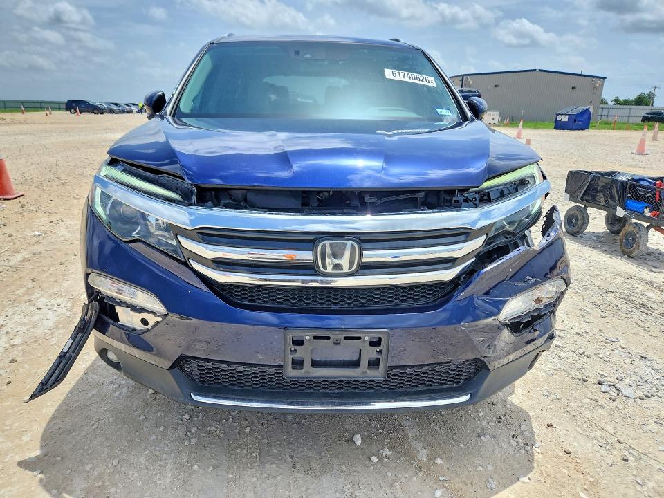 Фото 5 с аукциона – 2017 HONDA PILOT с VIN 5FNYF6H05HB041049