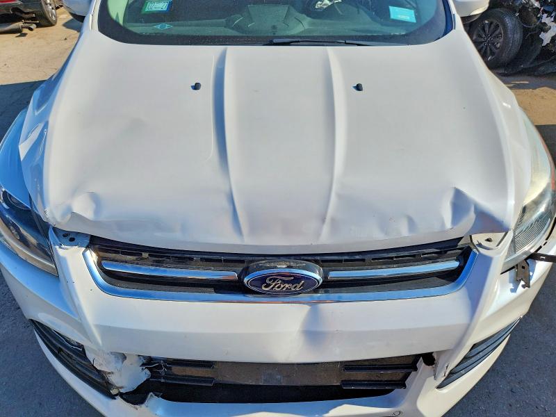 Photo 12 from auction – 2014 FORD ESCAPE with VIN 1FMCU0J93EUA28871