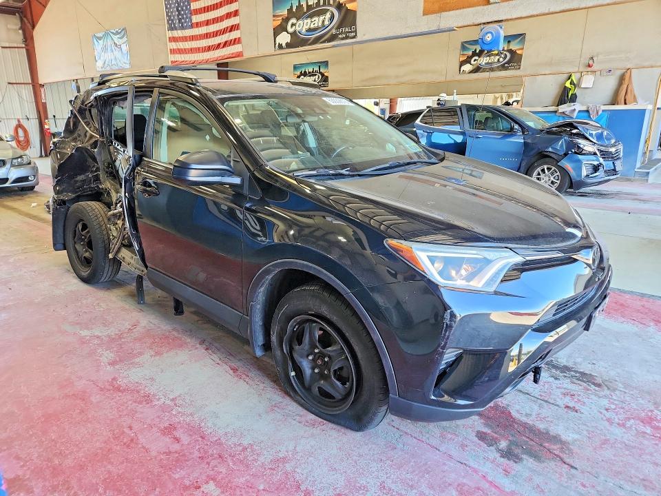 Photo 4 from auction – 2018 TOYOTA RAV4 with VIN 2T3BFREV5JW759675