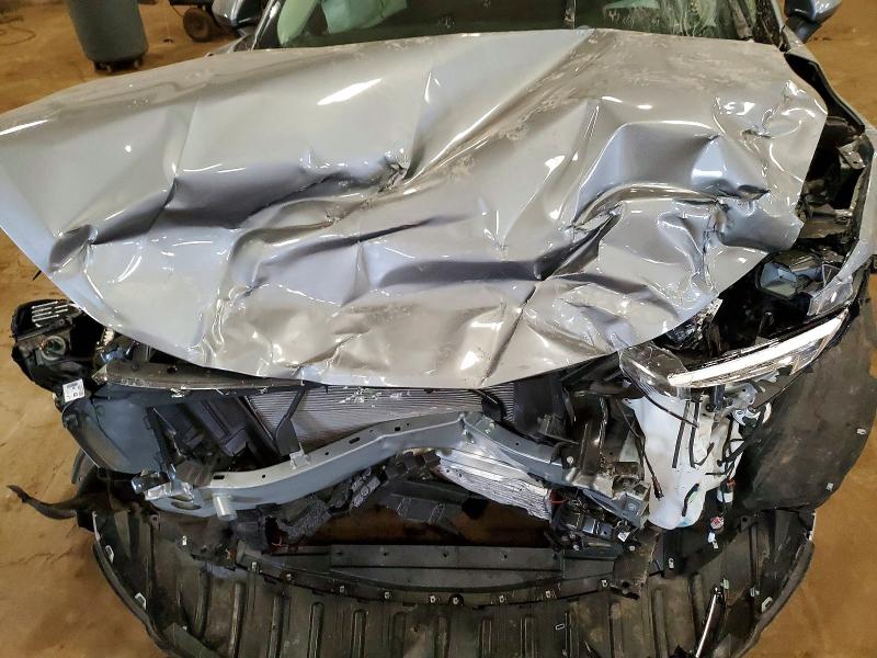 Photo 11 from auction – 2023 BUICK ENVISION with VIN LRBFZSR44PD153290