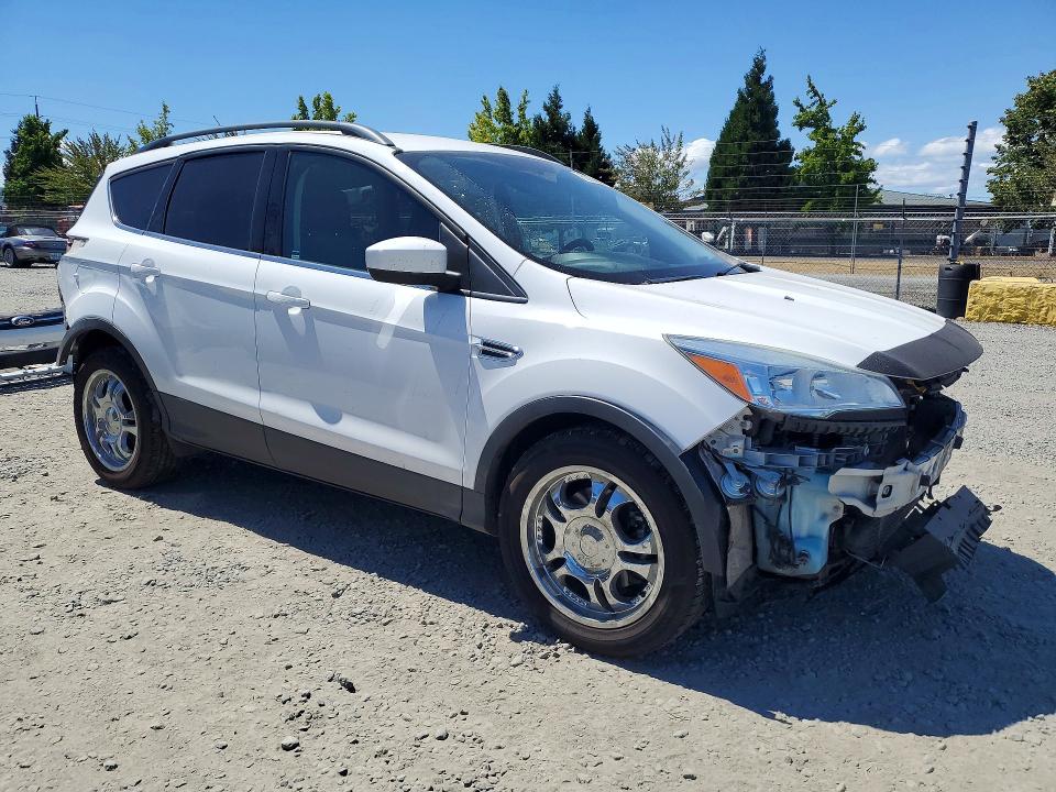 Photo 4 from auction – 2015 FORD ESCAPE with VIN 1FMCU9G92FUC64313