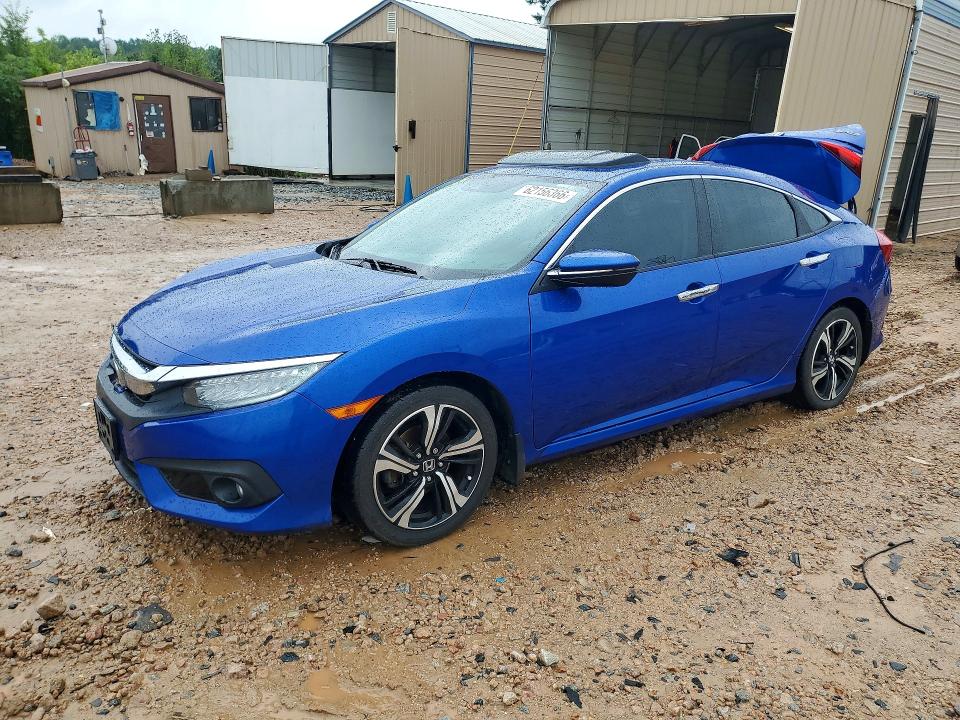 HONDA CIVIC 2016 with VIN 19XFC1F91GE021034 - Photo from auction