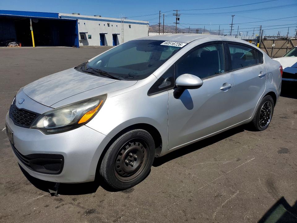 KIA RIO 2014 with VIN KNADM4A35E6354619 - Photo from auction