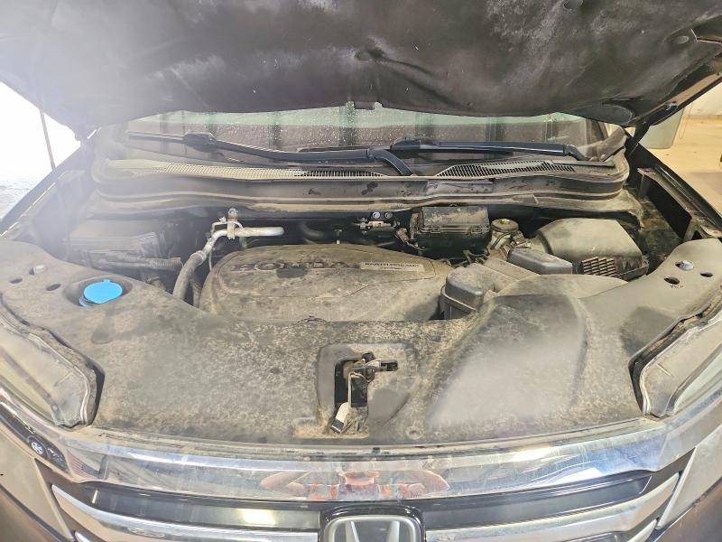 Photo 12 from auction – 2017 HONDA PILOT with VIN 5FNYF6H99HB078488