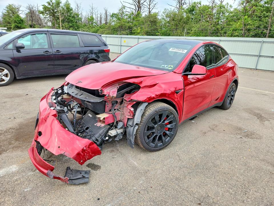 TESLA MODEL Y 2022 with VIN 7SAYGDEE7NF342566 - Photo from auction
