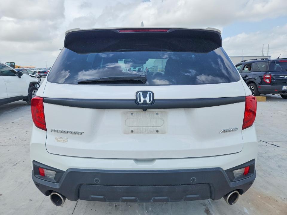 Photo 6 from auction – 2023 HONDA PASSPORT with VIN 5FNYF8H52PB040916
