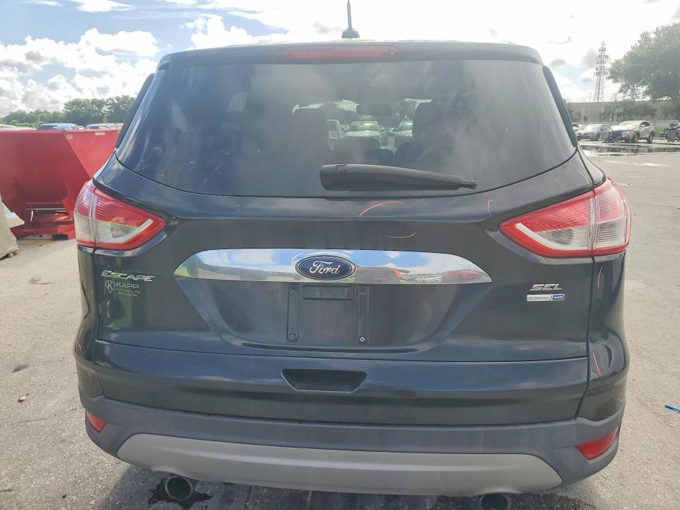 Photo 6 from auction – 2013 FORD ESCAPE with VIN 1FMCU9H97DUA41437