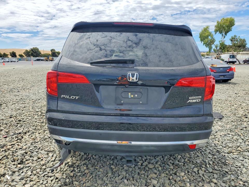 Photo 6 from auction – 2016 HONDA PILOT with VIN 5FNYF6H94GB095200