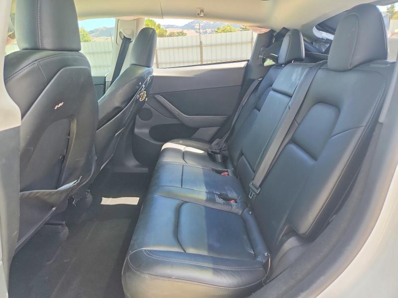 Photo 11 from auction – 2023 TESLA MODEL Y with VIN 7SAYGDEE9PF742471
