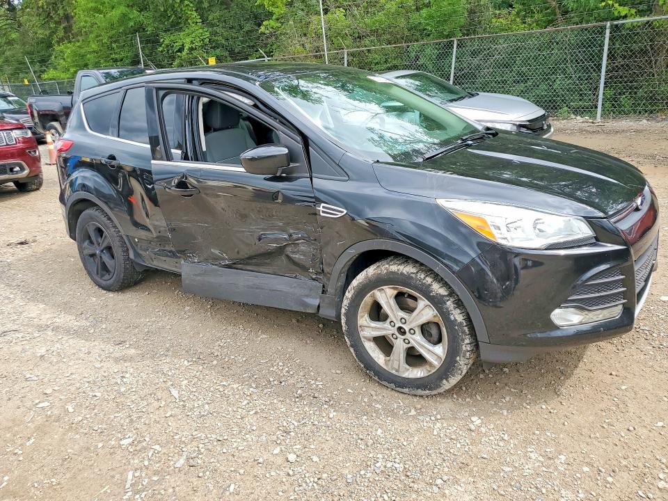 Photo 4 from auction – 2014 FORD ESCAPE with VIN 1FMCU0GX4EUB94662