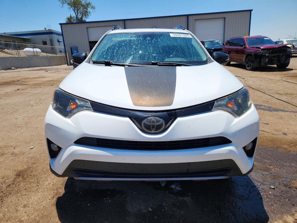 Photo 5 from auction – 2018 TOYOTA RAV4 with VIN 2T3RFREV1JW709967