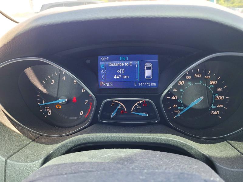 Photo 8 from auction – 2014 FORD FOCUS with VIN 1FADP3K21EL358541
