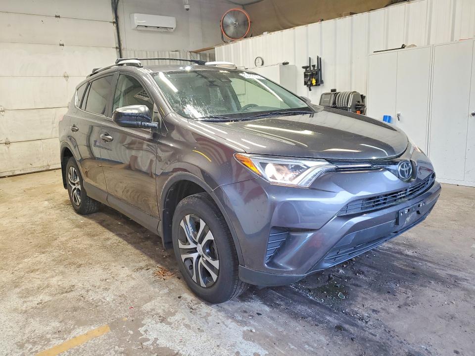 Photo 4 from auction – 2017 TOYOTA RAV4 with VIN JTMZFREV6HJ706099