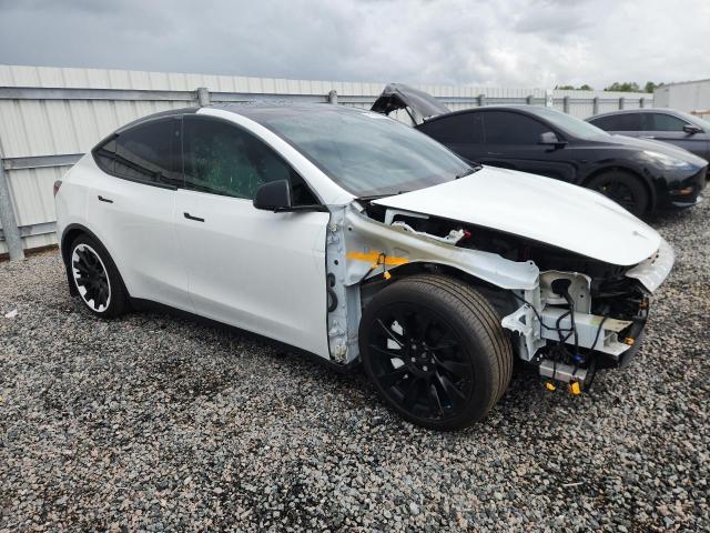 Photo 4 from auction – 2023 TESLA MODEL Y with VIN 7SAYGAEE2PF663240