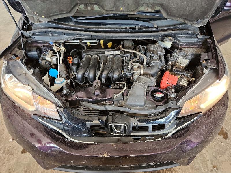 Снимка 11 от търг – 2015 HONDA FIT с VIN 3HGGK5H8XFM775817