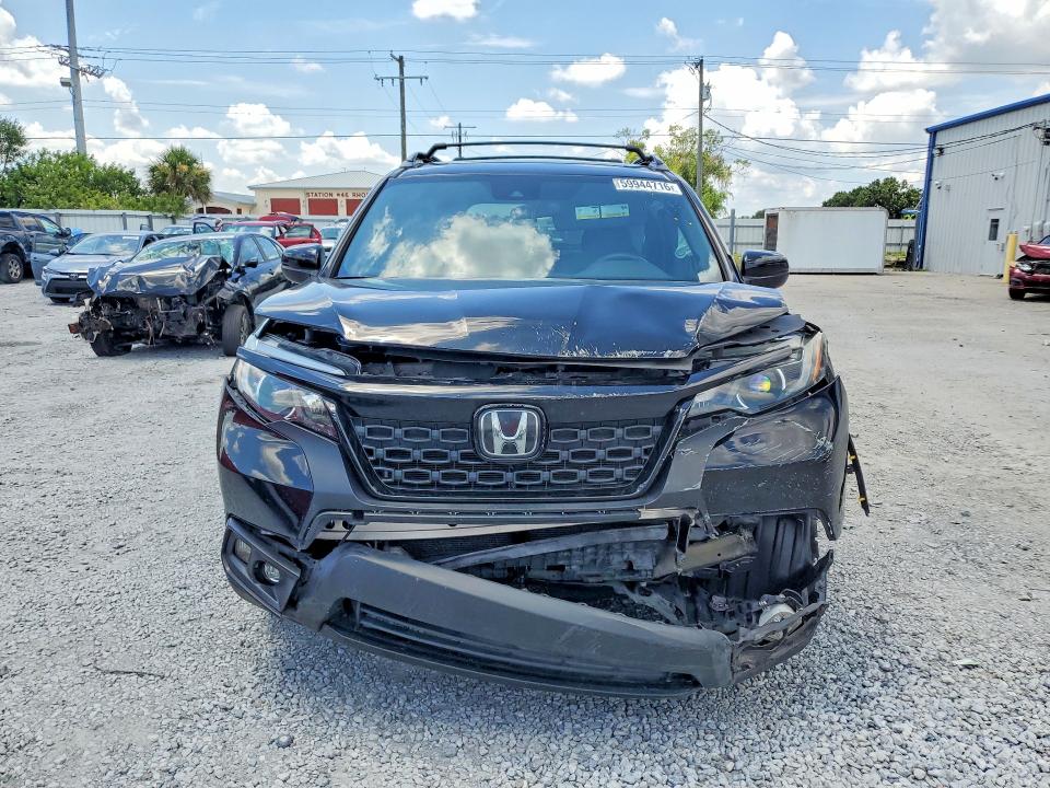 Photo 5 from auction – 2021 HONDA PASSPORT with VIN 5FNYF8H22MB004922