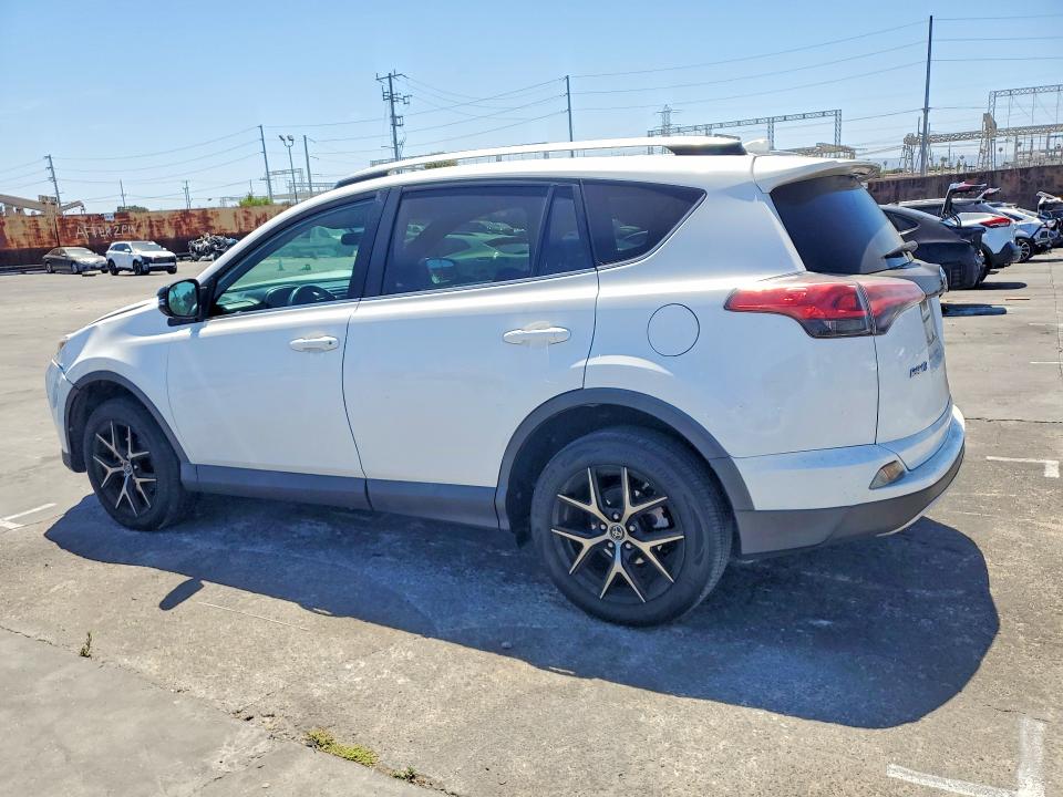 Photo 2 from auction – 2016 TOYOTA RAV4 with VIN 2T3NFREV5GW305142