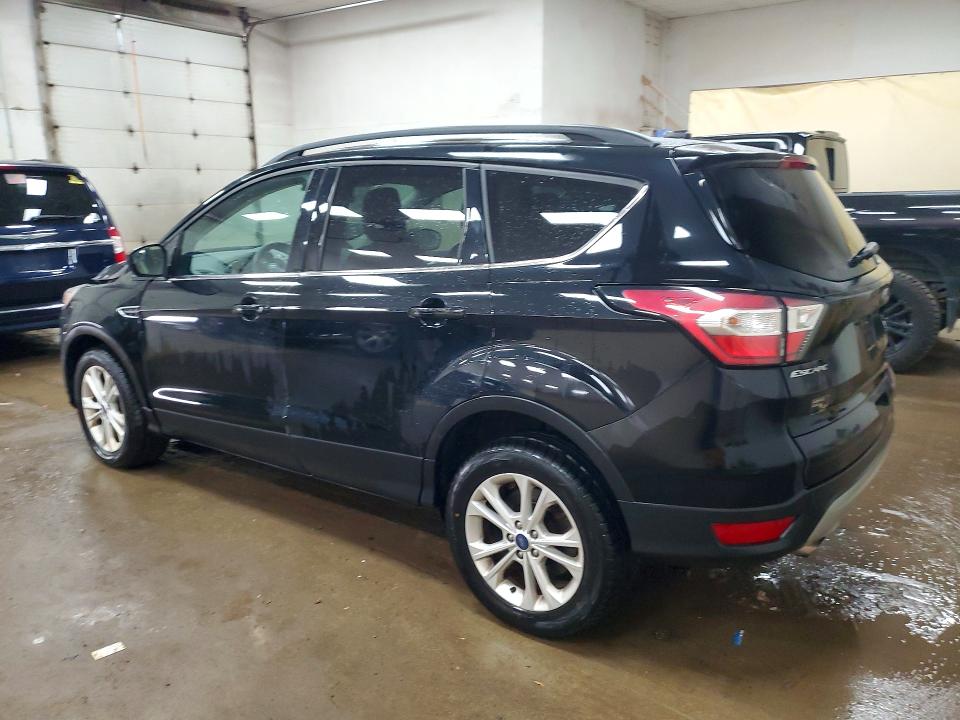 Photo 2 from auction – 2018 FORD ESCAPE with VIN 1FMCU9GD5JUB52134