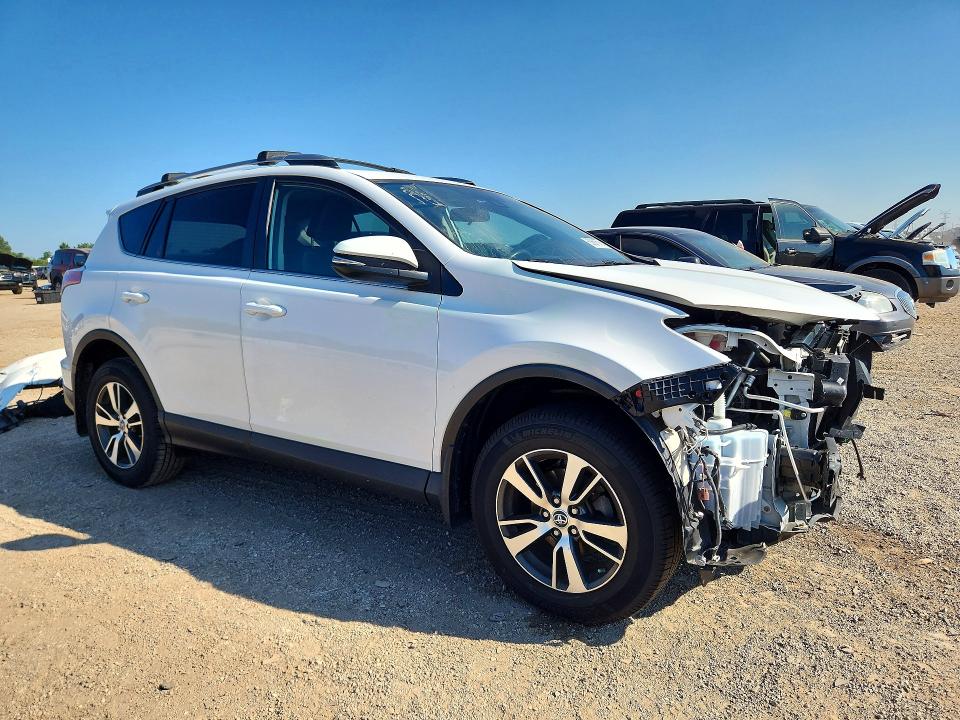 Photo 4 from auction – 2018 TOYOTA RAV4 with VIN 2T3RFREV5JW856809