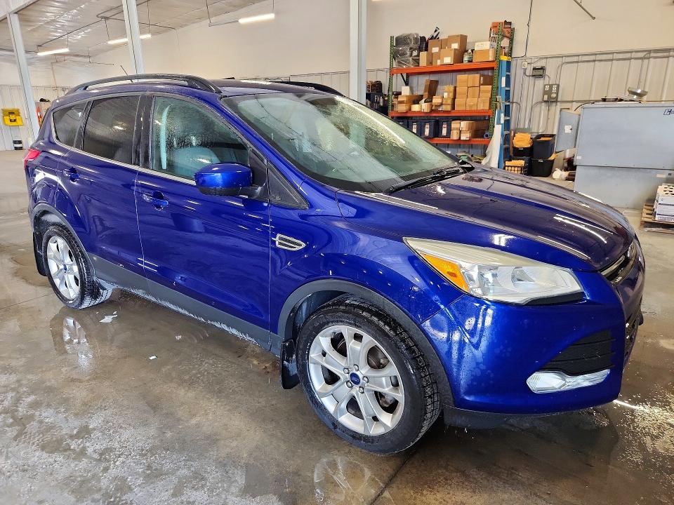 Photo 4 from auction – 2014 FORD ESCAPE with VIN 1FMCU9G96EUB72491