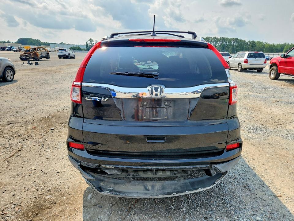 Photo 6 from auction – 2016 HONDA CR-V with VIN 2HKRM3H73GH558582