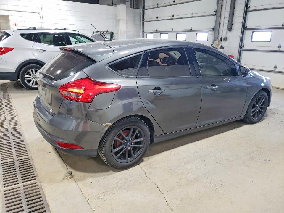Photo 3 from auction – 2015 FORD FOCUS with VIN 1FADP3K25FL281173