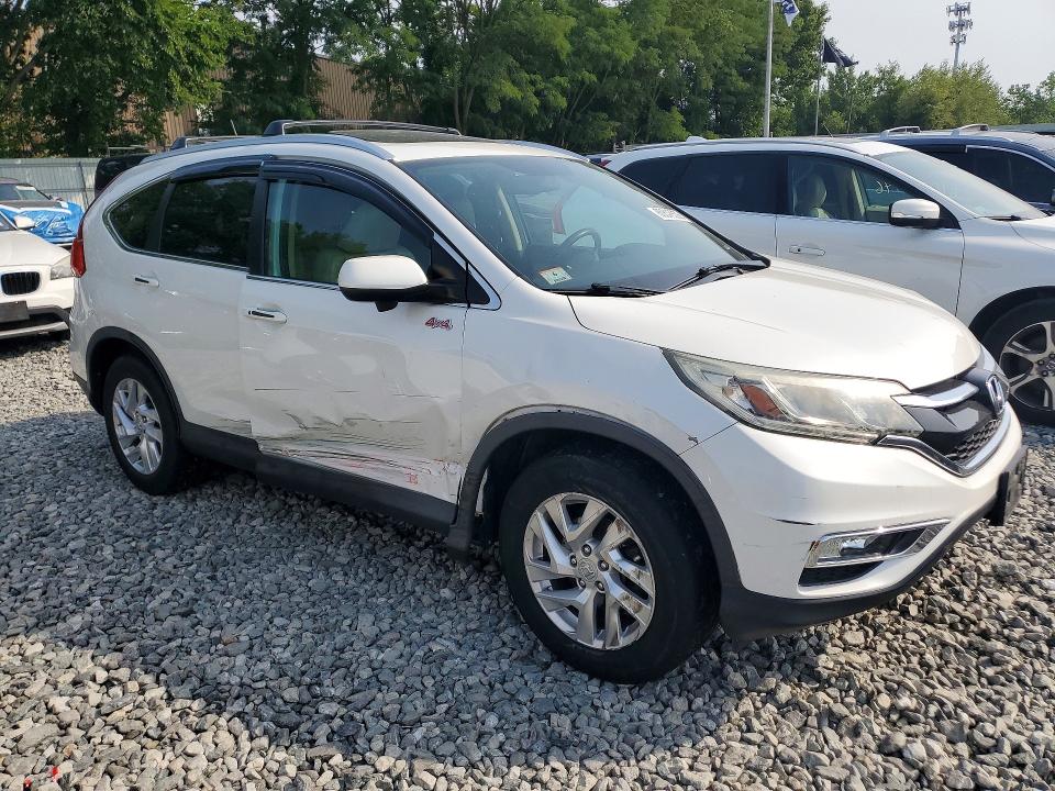 Photo 4 from auction – 2015 HONDA CR-V with VIN 5J6RM4H74FL064774