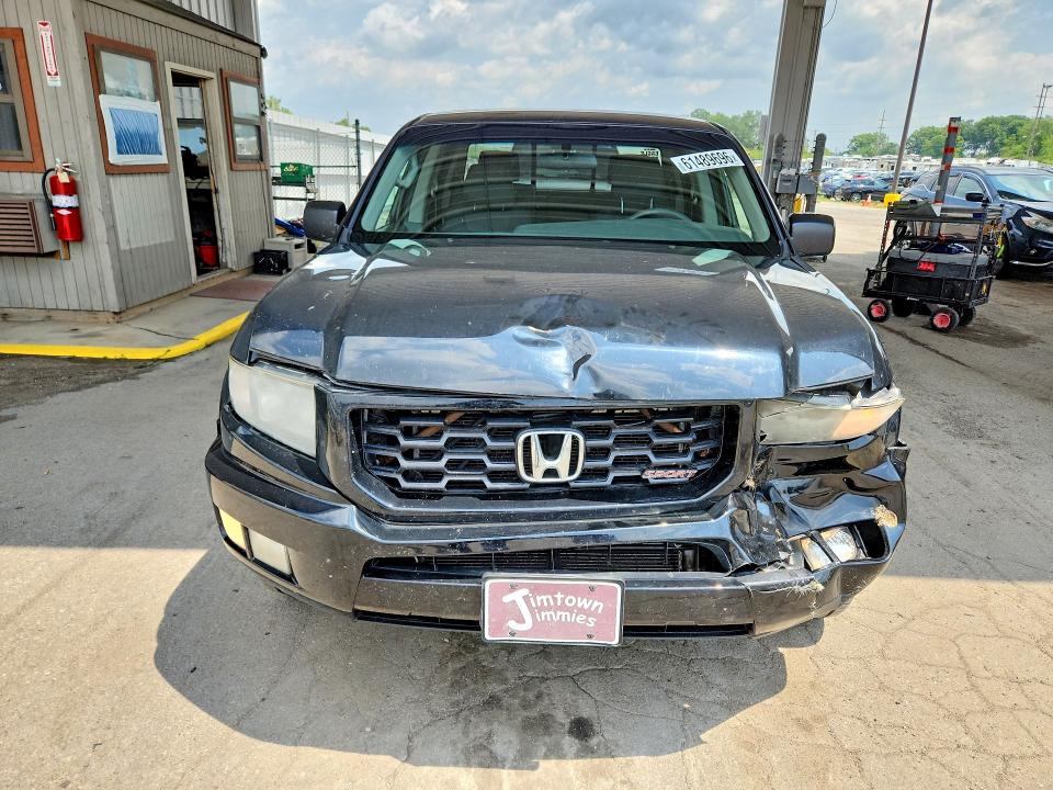 Photo 5 from auction – 2012 HONDA RIDGELINE with VIN 5FPYK1F78CB455649