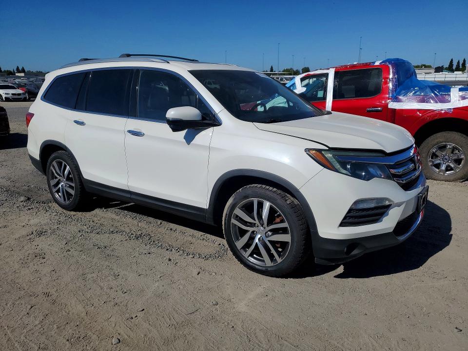 Photo 4 from auction – 2016 HONDA PILOT with VIN 5FNYF6H9XGB068308