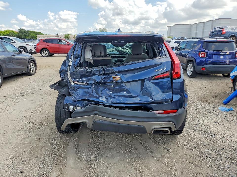 Photo 6 from auction – 2021 CADILLAC XT4 with VIN 1GYFZCR43MF028086