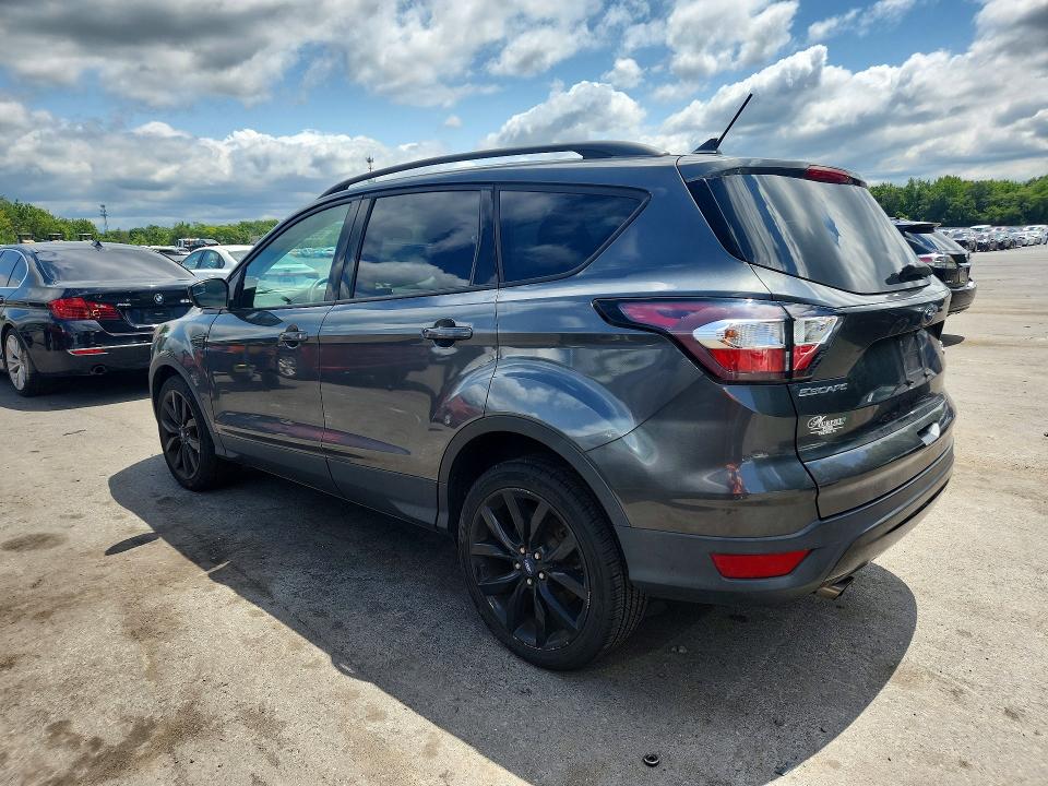 Photo 2 from auction – 2018 FORD ESCAPE with VIN 1FMCU9GD3JUA59709