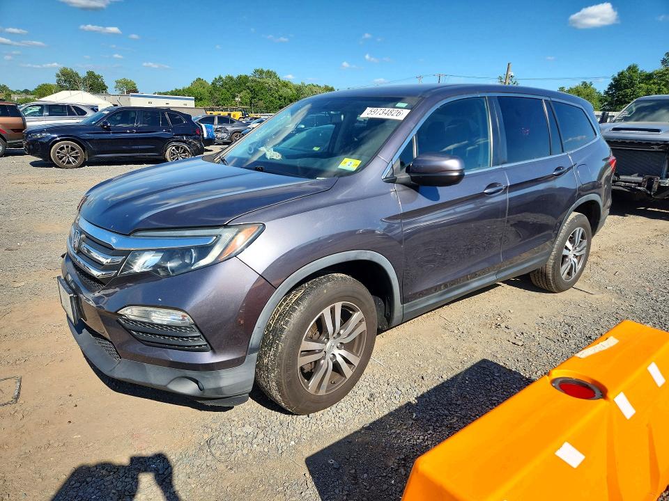 HONDA PILOT 2017 with VIN 5FNYF6H78HB016286 - Photo from auction