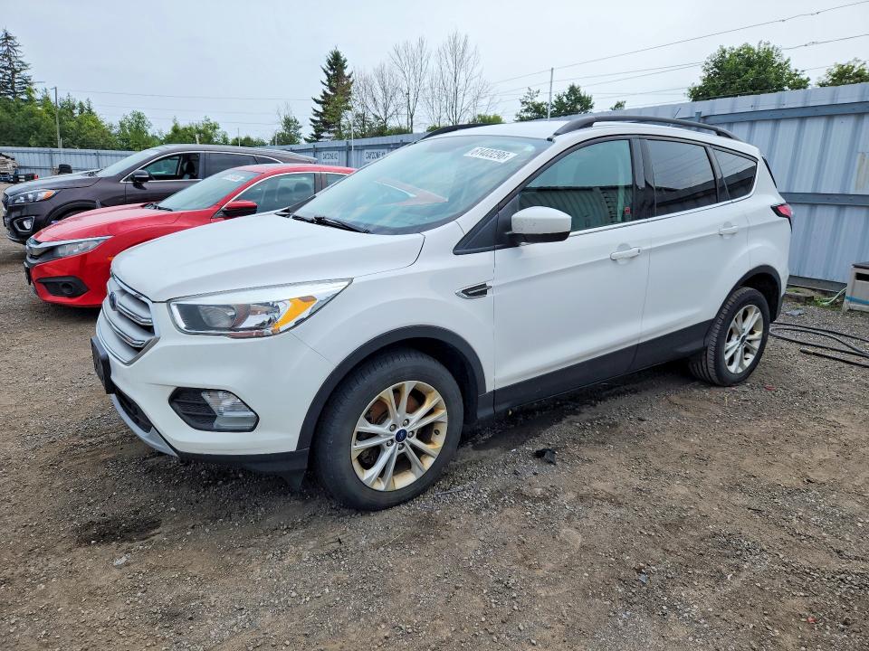 FORD ESCAPE 2018 with VIN 1FMCU9GD1JUB00421 - Photo from auction